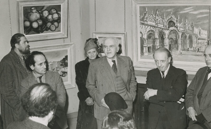 John Copley speaking at the Royal Society of British Artists, Ehtel Gabian behind <i>circa</i> 1948